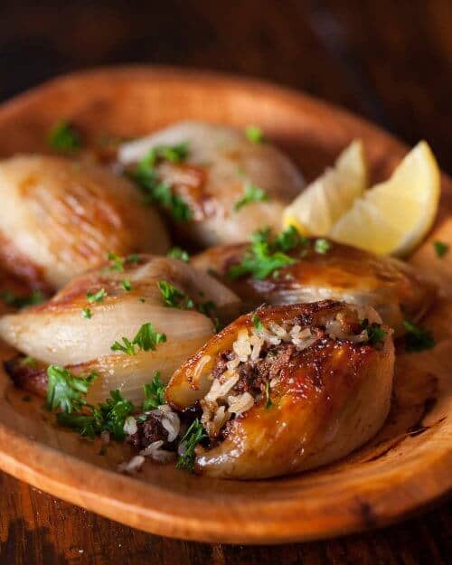 Delectable meat stuffed onions in a bowl. 