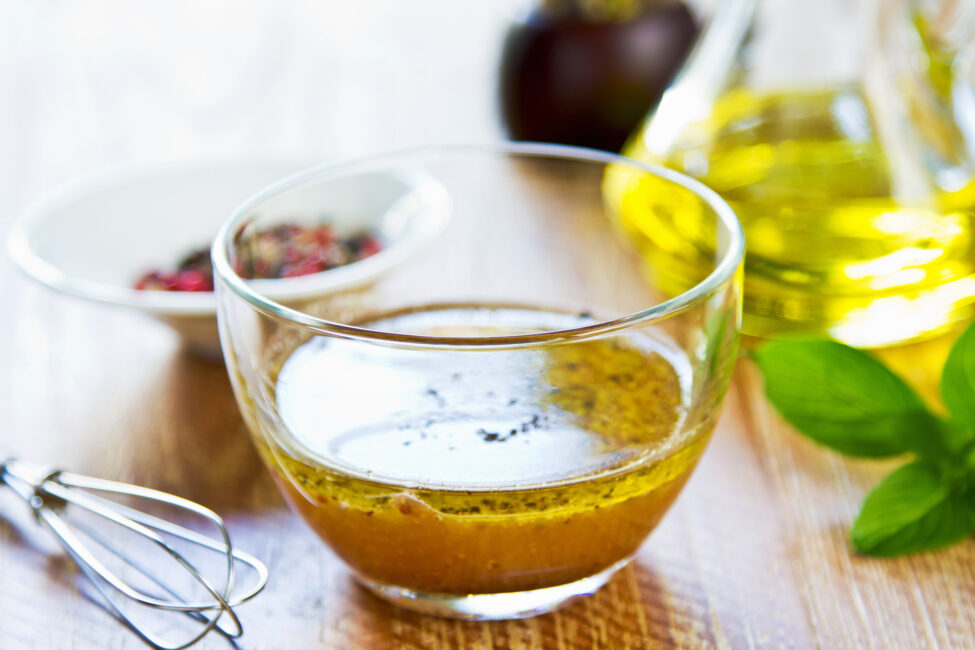 Greek Dressing Recipe with whisk and glass bowl
