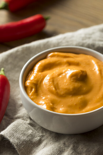 Homemade Spicy Mayo in a white dish
