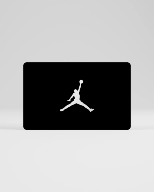 A sleek black Nike Gift Card showcasing a striking white silhouette of a basketball player mid-air, capturing the essence of athleticism and the spirit of the game.